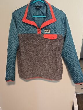 Patagonia Teal Jacket with Pink and Purple Logo Accents
